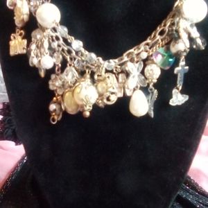 Charm bracelet or adjustment to make a anklet or a necklace.